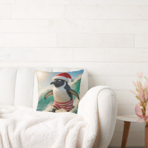 Pinguin surft auf einer Meereswelle zu Weihnachten Kissen