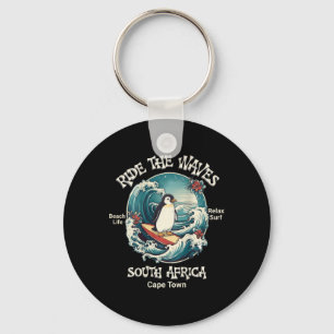 Pinguin surft Wellen Südafrika Cape Cod Surft Schlüsselanhänger