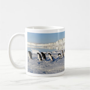 Pinguine in der Schnee-Tasse Kaffeetasse