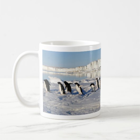 Pinguine in der Schnee-Tasse Kaffeetasse (Links)
