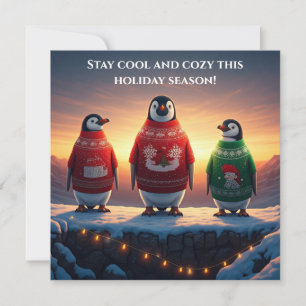 Pinguine in hässlichen Pullovern als Weihnachtskar Feiertagskarte