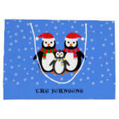 Pinguine zum ersten Weihnachtsgebrauch blau Große Geschenktüte (Rückseite)