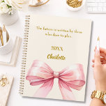 Pink bow beige cream inspirational quote 2026 planer<br><div class="desc">A soft beige,  cream colored background,  decorated with a large pink bow.  Quote: Live with intention.  The future is written by those who dare to plan.</div>