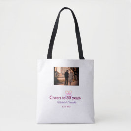 Pink bow cheers to 50 years anniversary wedding  tasche