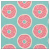 Pink Doughnut mit Sprinklen Muster auf Aqua Blue Stoff (Nahaufnahme)
