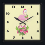 Pink Flamingo in Santa Hat Whimsical Christmas Quadratische Wanduhr<br><div class="desc">A clock with a tropical themed Christmas flamingo wearing a pink santa hat. Underneath its feet is a candy cane bouquet with pretty tropical flowers and pink berries. A sprig of holly on its chest.</div>