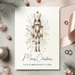 Pink & Gold Frohe Weihnachts-Nutcracker-Karte Feiertagskarte<br><div class="desc">Entdecken Sie die Eleganz der Urlaubssaison mit unserer individuell anpassbaren Nutcracker Weihnachtskarte. Tauchen Sie ein in die zarten Wasserfarben der botanischen Bilder, als ein hölzerner Nussknacker auf dem Schild steht. Die sanften Farbtöne rosa Gold und Beige sorgen für ein gemütliches und dennoch luxuriöses Ambiente, das es zu einer perfekten Wahl...</div>