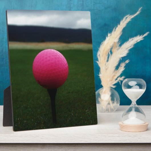 Pink Golf Ball auf dem Golfplatz Fotoplatte (Seite)