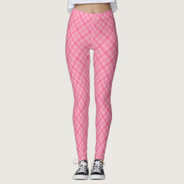 Pink plaid leggings displayed front view, worn 