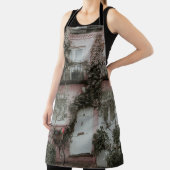 PINK UND WEISS GEMALTETES HAUS MIT PFLANZE A SCHÜRZE (InSitu)