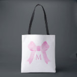 Pink Watercolor Bow Girl Monogram Tasche<br><div class="desc">Dieses Design zeichnet sich durch einen niedlichen Aquarellpinken Bogen mit Platz für einen Monogramm-Buchstaben aus. Klicken Sie auf die Schaltfläche Anpassen, um den Text zu verändern oder die Grafik zu verschieben! Variationen dieses Designs sowie der Koordinationsprodukte sind in unserem Shop, zazzle.com/store/doodlelulu, erhältlich. Kontaktieren Sie uns, wenn Sie dieses Design für...</div>