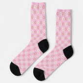 Pink-weiße Blume-Muster auf hellrosa Socken (Linkes Detail)