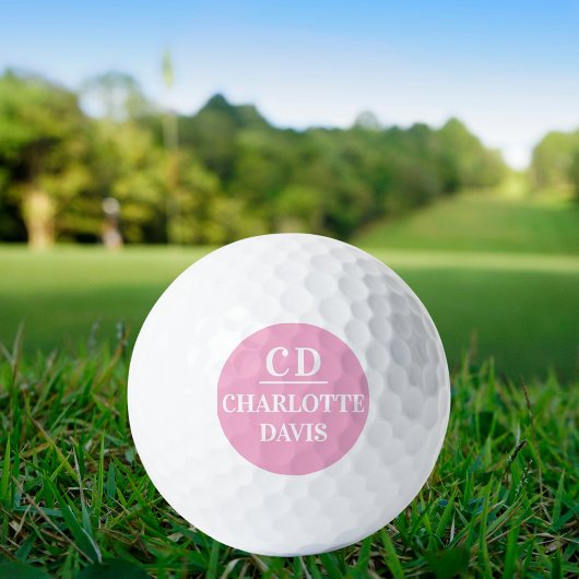 Pink-weiße Monogramm-Initialnamen Golfball