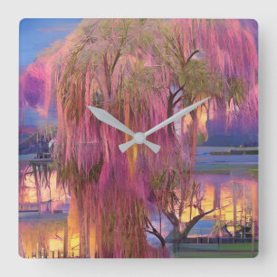 Pink Willow tree bei Sonnenuntergang am Teich Quadratische Wanduhr