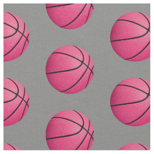 Pinkfarbene Basketbälle auf grauem, beliebigem Far Stoff