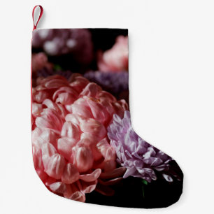 Pinkfarbener Bouquet mit lila aster Blume im Licht Kleiner Weihnachtsstrumpf