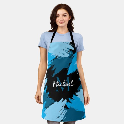Pinselstriche in blauen Farbtönen mit Monogramm Schürze (Getragen)