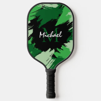 Pinselstriche in grünen Farbtönen mit Monogramm Pickleball Schläger