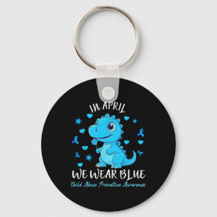Pinwheel Dino Im April tragen wir blauen Kindesmis Schlüsselanhänger