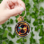 Pisces Zodiac-Zeichen im kosmischen künstlerischen Schlüsselanhänger (Hand)