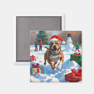 Pitbull-Hund läuft im Schnee mit Weihnachtsmütze Magnet