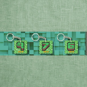 Pixeliger grüner Gebäude-Level-9 Schlüsselanhänger