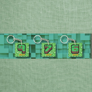 Pixeliger grüner Gebäude-Level-9 Schlüsselanhänger