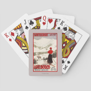 Plakat mit Skifahrerin mit Blick auf Adelboden Spielkarten