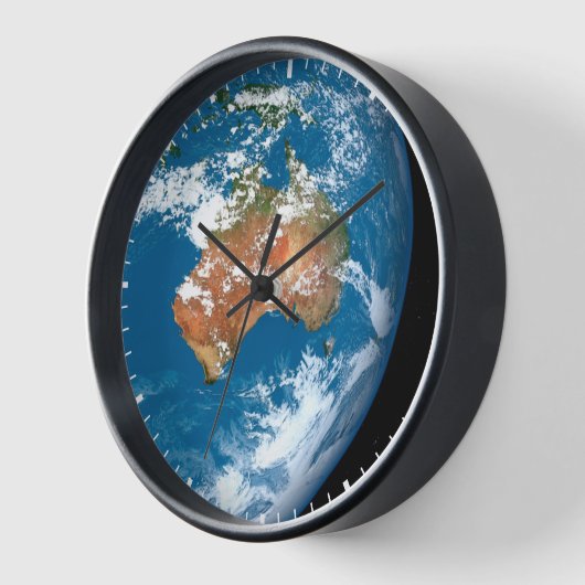 Planet Erde mit Wolken über Australien. Uhr (Winkel)