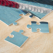 Plastiktrennzeichen in einer Swimmingpoolschaffung Puzzle (Seite)