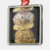 Plätzchen in einem Stapel Silbernes Ornament (Links)