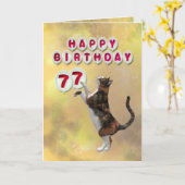 Playful cat and 77th Happy Birthday balloons Karte (Gelbe Blume)