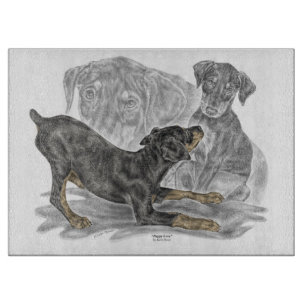 Playful Doberman Pinscher Puppies Schneidebrett