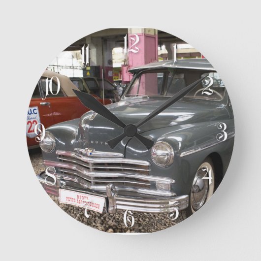 Plymouth Special De Luxe. Im Jahre 1949 errichtet Runde Wanduhr (Vorderseite)