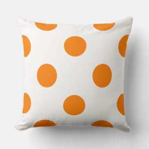Polka Dots in Weiß auf Orange Kissen