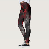 Polygonale, schwarze und rote Leggings (Links)