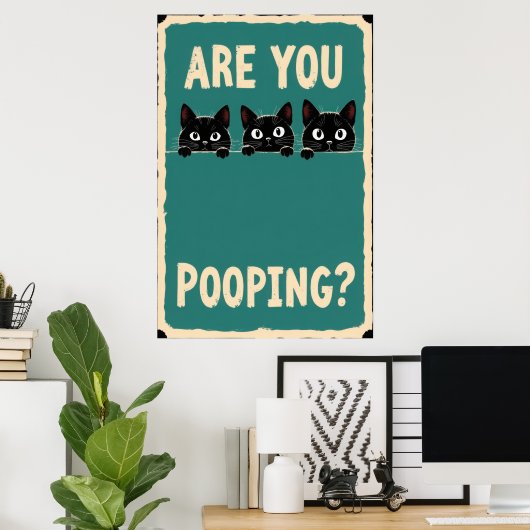 Pooping showing three black cats peeking over poster (Heimbüro)