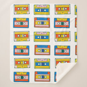 Pop Art 90s nahtlose Muster von Musikkassetten. B Sherpadecke