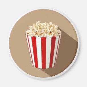 Popcorn im Hintergrund eines braunen Kreises Magnet