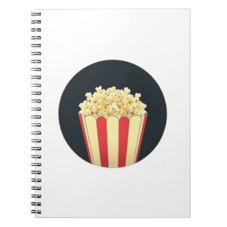 Popcorn im Hintergrund eines schwarzen Kreises Notizblock