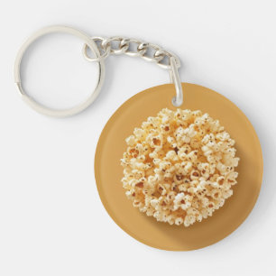 Popcorn-Kreis mit braunem Hintergrund Schlüsselanhänger