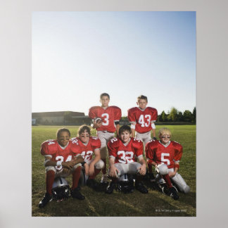 Portrait der Jugendfußballmannschaft auf dem Feld Poster