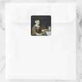 Portrait eines Mädchens an einem Tisch platziert Quadratischer Aufkleber (Tasche)