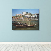 Portugal, Porto, Schiff mit Weinfässern Leinwanddruck (Insitu (Holzboden))