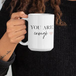 Positive Motivation Sie sind genug Zitat Kaffeetasse<br><div class="desc">Suchen Sie eine tägliche Erinnerung, dass Sie genug sind? Wir stellen Ihnen unsere Angebote "You Are Enough" vor, mit denen Sie sich positiv motivieren und Ihre Stimmung steigern können, wann immer Sie sie brauchen. Mit diesen inspirierend Produkten können Sie die bestärkende Botschaft der Selbstakzeptanz und Selbstverständlichkeit mit sich führen, wohin...</div>
