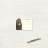 Post-Itanmerkungen Text des lustigen Gorillas Post-it Klebezettel (Auf Schreibtisch)