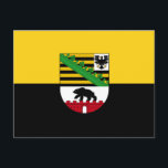 Postkarte Sachsen-Anhalt<br><div class="desc">Postkarte mit variantenreicher Flagge Sachsen-Anhalts; Design mit zwei waagerechten gelben (goldenen) und schwarzen Bändern und mit dem Wappen des Staat in der Mitte</div>
