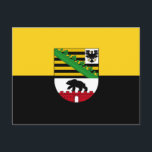 Postkarte Sachsen-Anhalt<br><div class="desc">Postkarte mit variantenreicher Flagge Sachsen-Anhalts; Design mit zwei waagerechten gelben (goldenen) und schwarzen Bändern und mit dem Wappen des Staat in der Mitte</div>