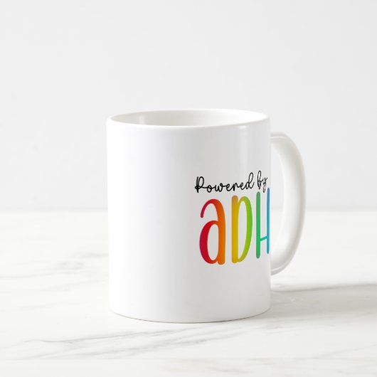 Powered by ADHD | Rainbow Typografie Kaffeetasse (VorderseiteRechts)