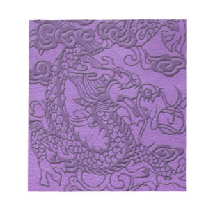 Prägeartiger Drache auf lila ledernem Druck Notizblock